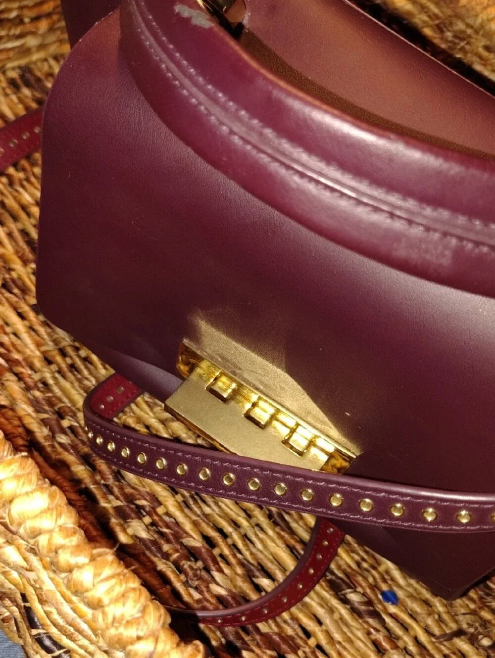 Designer Iconic Grommetted Crossbody Leather Top-Handle Satchel in Deep Plum